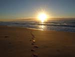 setting sun and footprints